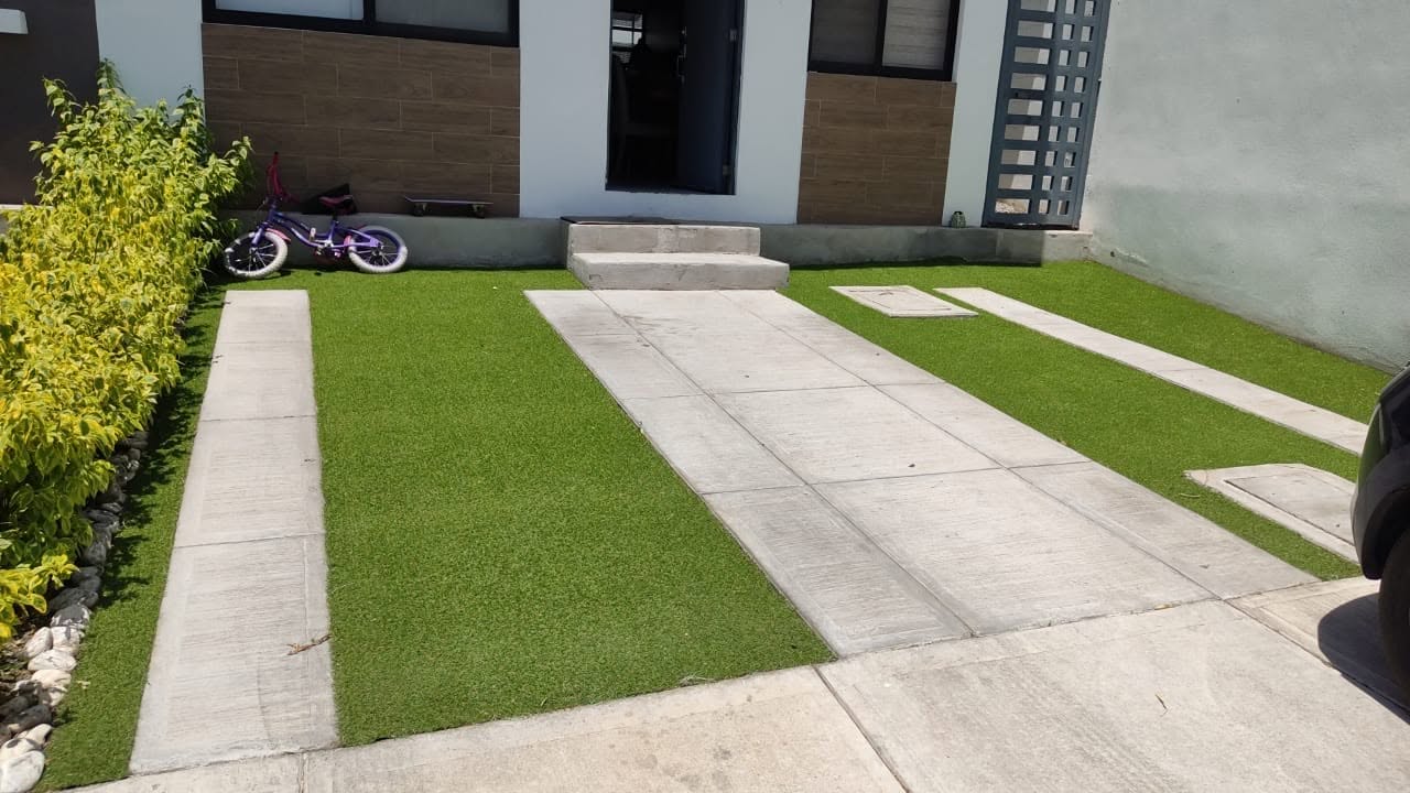 Pasto sintético jardín residencial